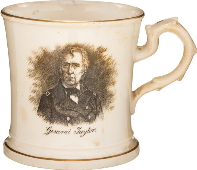 Item #36359 CAMPAIGN SOFT PASTE MUG WITH TRANSFER PORTRAITS OF "GENERAL TAYLOR" AND "WASHINGTON" ON EITHER SIDE, WITH GOLD TRIP AT LIP, BASE AND HANDLE. Zachary Taylor.